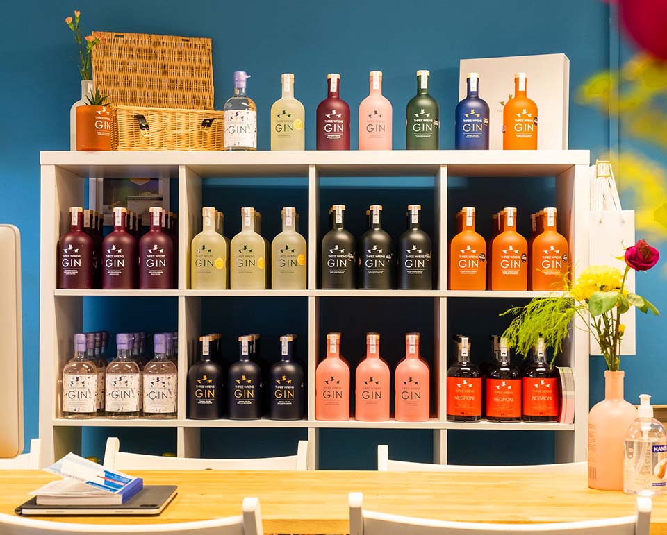 gin shop bottles shelves